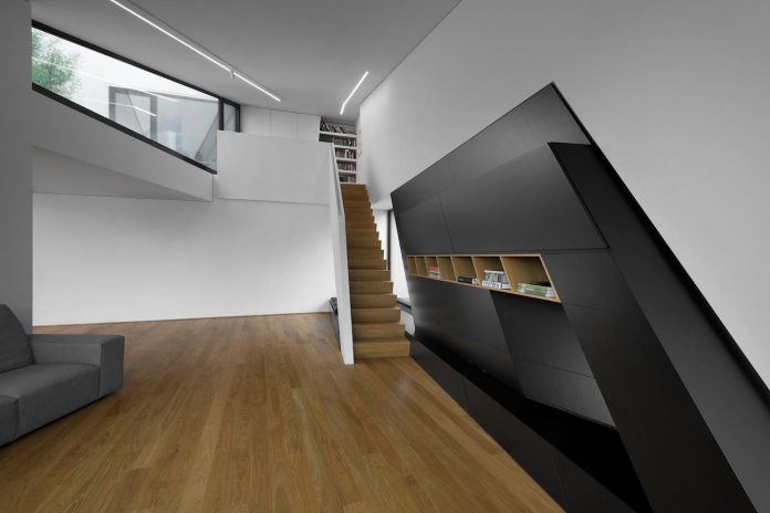 minimalist-home-design-located-south-sloping-plot-residential-part-prague-13