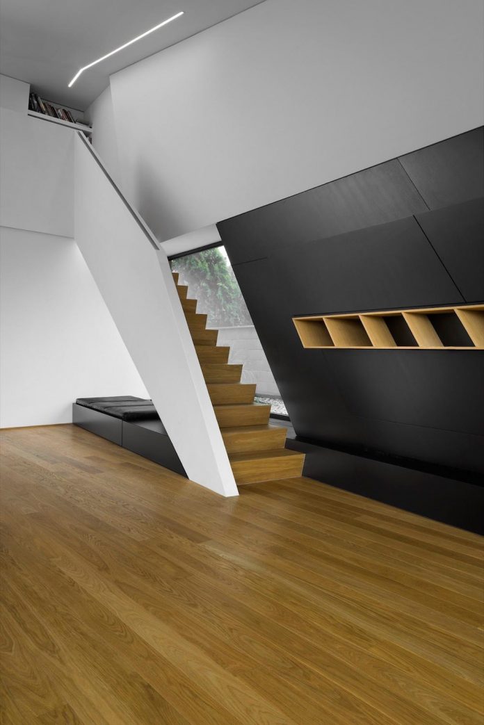 minimalist-home-design-located-south-sloping-plot-residential-part-prague-16