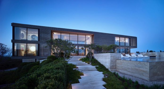 perched-ocean-pond-field-house-almost-appears-allow-landscape-run-24