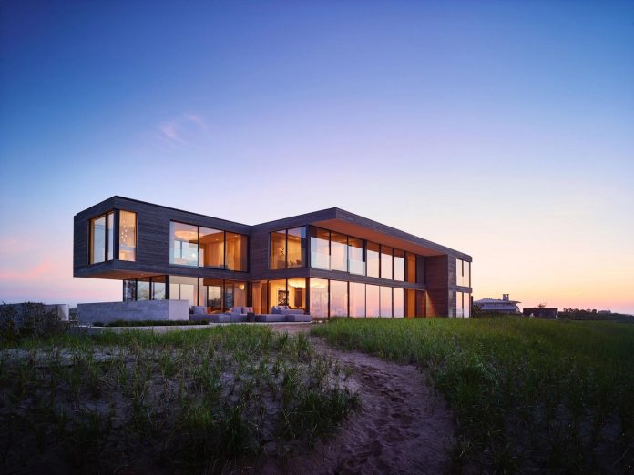 perched-ocean-pond-field-house-almost-appears-allow-landscape-run-25