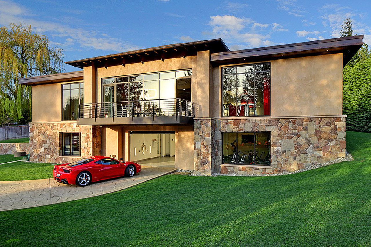 Modern Home Design Seen from a Fancy Car Addicted who has Modern Home Design Seen from a Fancy Car Addicted who has