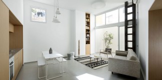 Adjusting a Mish-Mash of Small Rooms and Corridors into Jaffa Garden Apartment by Itai Palti