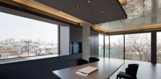 OKM 4 story building designed for a private residence and apartment in Tokyo by Artechnic