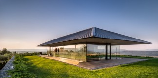 Walls made of gabion and awesome 360 degree views of Observation house by I/O architects