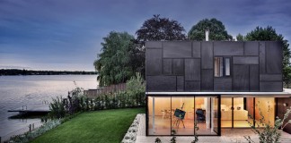 Horseshoe-shaped Lake Home by Maximilian Eisenköck