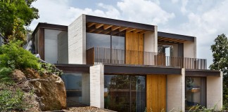 Tucán House sits on top of a hill of Valle de Bravo, designed by Taller Héctor Barroso