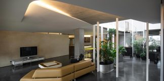Sky Villa on the top floor of a high rise building in downtown Taipei by CJ Studio