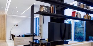 GH Mild clean Apartment with light-toned wood, white stone, and black metalwork by Archetonic