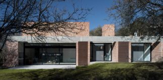 Estudio BLT design the GPL Brick House surrounded by typical trees of the sierras in Mendiolaza, Argentina