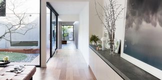 Behind an unassuming façade, the Courtyard house opens up to reveal a pared back design response, mixed with luxurious materials, and practical detailing
