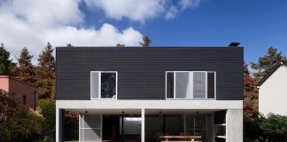 House DV by Colle-Croce located in an environment which is characterized by a long-standing, profuse vegetation