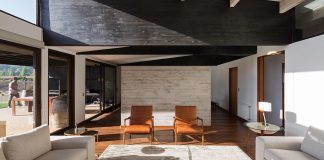 Laminated wood as main structural material of the TH house located on a 5000 sqm plot near Santiago de Chile