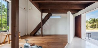 Old barn which used to store farming equipment converted into a home with a design office and a master bedroom
