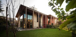Twin House consists of two cubic volumes mounted on a concrete basement designed by StudioPietropoli