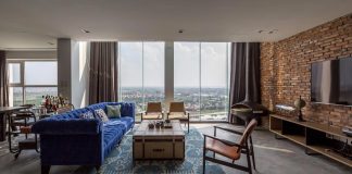 Contemporary design style applied in combination with the use of classic industrial-style furniture