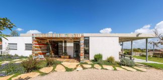 LaHO residence, a colourful one story house spread across a corner lot