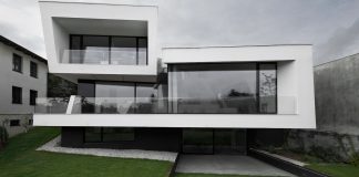 Minimalist home design located on a south sloping plot in a residential part of Prague