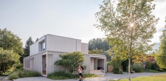 Residence keeps strong spatial connection to the surrounding shore zone of Lake Biel amidst lush vegetation