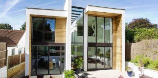 2 storey family home with glazed atrium that brings light deep into the house