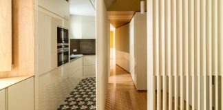 Arguelles Apartment Refurbishment into bright wooden new home