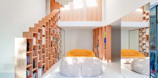 Bookshelf House: a bright and playful home outside Paris