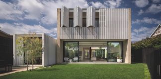 Hiding House: contemporary compact house with features that reduce energy use