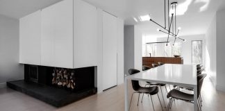 Immaculate white adds a lot of light in contrast with the black and walnut wood elements