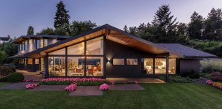 Modern dormer with a low sweeping roof that opens up to an amazing view of Portland