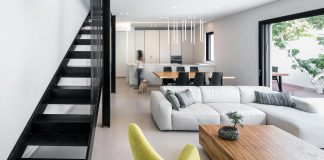 Modern renovation of a single-story, semi-detached house from the 1950's
