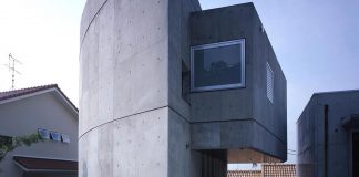 Concrete half rounded, half square home by Kugatsuno Kaze Design Office