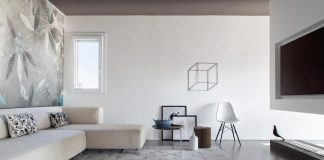 Simple and stylish minimalist apartment designed by Studio Tenca & Associati in Milan