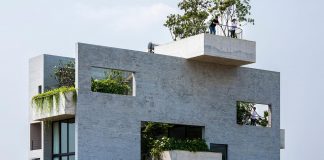 Binh House by Vo Trong Nghia Architects, an exposed concrete home that is also a house for trees