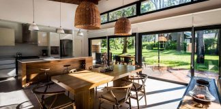 First Eighth contemporary summer home located in a coniferous forest