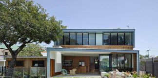 Kieron Gait Architects redesigned a 1880’s house adding a fully glass rear