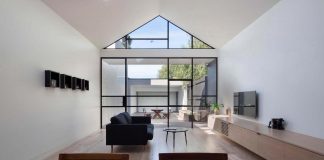 Burnley residential renovation included an industrial styled glass wall to maximize the back yard views
