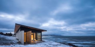 The private side of a house in Canada opens to the views of the Atlantic