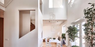 A two-storied house for a young family with the first floor opened