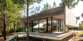 S+J House: House built entirely out of exposed concrete with minimalist interior spaces and little maintenance requirements