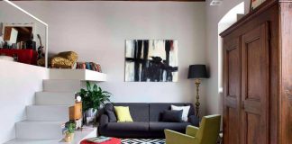 Modern meets traditional in this apartment located in a historic building in Paesana, Italy