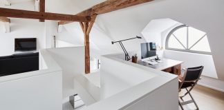 Main East Side Lofts: Renovation of a historic building and a contemporary addition to complete the original volume