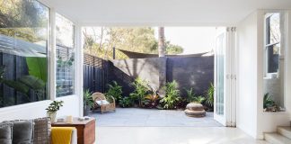 A white box plugged in to an existing East Fremantle home