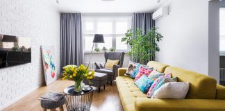 Chic apartment design with a touch of different colors and materials create a warm and cozy home