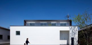 House in the neighborhood of an old village designed by NRM Architects Office