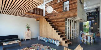 Transformation of an coach house into a spectacular home and workspace with materials originated from a demolished neighbour house
