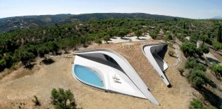 Ypsilon shaped green roof has bifurcating pathways that define three courtyards that form distinct hemispheres