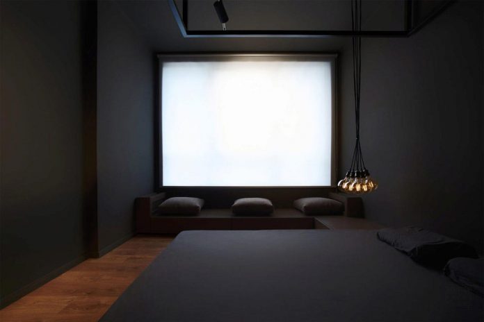 Dark apartment design with an example of minimalism  in 