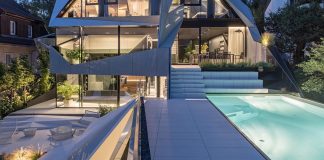 Light-flooded residential building developed in a crystalline and conspicuous shape