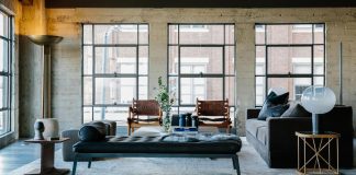Loft in Los Angeles showing an assortment of woods, textures, and metal finishes to visually warm and soften the space