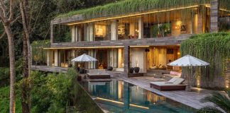 Chameleon concrete house in Singapore surrounded by greenery