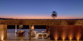 Stunning stone house which creates an organic interaction between nature and architecture